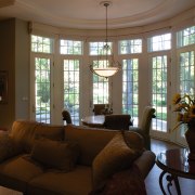 A view of some windows and doors by ceiling, estate, home, interior design, living room, real estate, room, window, window treatment, brown