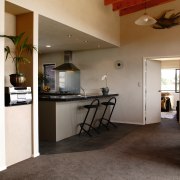 Lounge and kitchen area with exposed timber ceiling architecture, ceiling, floor, flooring, home, house, interior design, living room, real estate, brown