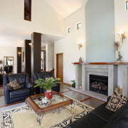 Large open plan home with white walls, dark architecture, ceiling, fireplace, hearth, home, interior design, living room, real estate, room, table, white