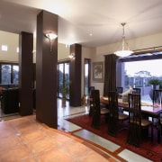 Large open plan home with dark columns, and estate, flooring, interior design, lobby, property, real estate, room, gray