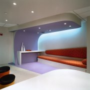 A view of the reception area, white tiled architecture, ceiling, floor, furniture, interior design, lighting, product design, room, gray, white