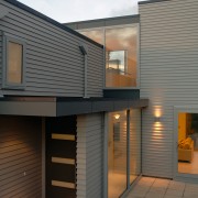 Entranceway of home with weatherboard cladding, large windows architecture, building, daylighting, facade, home, house, real estate, residential area, roof, siding, gray