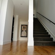 Entranceway and stairway of home with timber flooring apartment, architecture, ceiling, daylighting, floor, flooring, hardwood, home, house, interior design, laminate flooring, real estate, room, stairs, wood, wood flooring, gray, brown