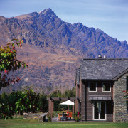 A view of the patio area, stone ground alps, cottage, elevation, estate, grass, highland, hill, hill station, home, house, landscape, mount scenery, mountain, mountain range, mountain village, mountainous landforms, national park, nature, plant, real estate, residential area, roof, rural area, sky, suburb, tree, wilderness, winter