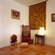 Mahogony winged chair in corner with side table, chair, floor, flooring, furniture, hardwood, home, interior design, living room, property, real estate, room, brown, gray