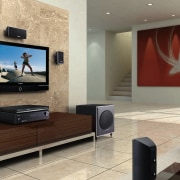 Lounge room with plasma tv on wall, with flat panel display, floor, flooring, interior design, living room, room, television, wall, orange