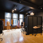 A view of a store, wooden flooring. - ceiling, floor, flooring, furniture, interior design, wood, black