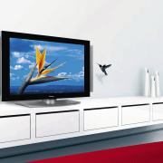 View of plasma tv on white shelving. - display device, flat panel display, furniture, multimedia, product, product design, shelf, shelving, white