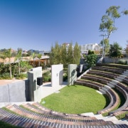 A view of the amphitheatre. - A view city, garden, grass, landscaping, mixed use, neighbourhood, real estate, residential area, tree, urban area, urban design, teal
