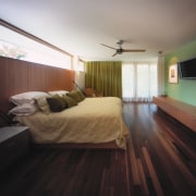 view of the bedroom featuring polished timber flooring, architecture, bed, bed frame, bedroom, ceiling, daylighting, floor, flooring, hardwood, home, house, interior design, laminate flooring, real estate, room, window, wood, wood flooring, black