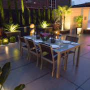 view of the outdoor dining area featuring alluminium backyard, furniture, interior design, lighting, patio, property, real estate, table, black