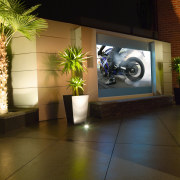 view of this outdoor entertaining area featuring 2.5 floor, flooring, interior design, light, lighting, lobby, wall, brown