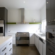 Kitchen with cream cabinetry and stainless steel appliances. cabinetry, countertop, cuisine classique, home appliance, interior design, kitchen, real estate, room, black, gray, white