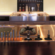 view of the kitchen where glass cabinet doors countertop, flooring, furniture, interior design, kitchen, restaurant, table, black