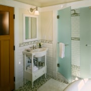 view of this bathroom featuring freestanding kohler bathtub, bathroom, floor, home, interior design, real estate, room, gray