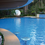 A close up view of the swimming pool. leisure, reflection, resort, swimming pool, vacation, water, water resources, teal