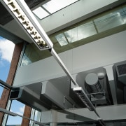 Interior of civic building showing airconditioning ducting and architecture, building, daylighting, glass, structure, window, gray, black