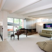 view of the lounge and stairs featuing white ceiling, house, interior design, living room, real estate, room, gray