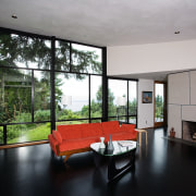 view of sthe living area featuring oak flooring, architecture, ceiling, house, interior design, living room, real estate, room, window, gray, black