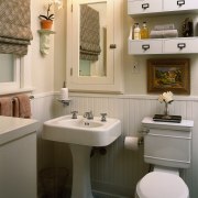 view of the traditional bathroom featuring freestanding vanity, bathroom, bathroom accessory, bidet, ceramic, floor, home, interior design, plumbing fixture, product design, room, sink, tap, toilet, toilet seat, gray, brown