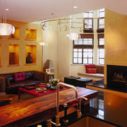 view of the kitchen area featuring black granite ceiling, dining room, home, interior design, living room, real estate, room, table, wall