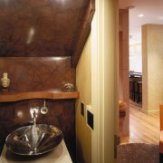 view of the powder room with custom designed architecture, bathroom, ceiling, countertop, floor, flooring, hardwood, home, interior design, lighting, real estate, room, wall, wood, wood flooring, wood stain, brown, red