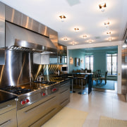 A view of a kitchen by St Charles countertop, cuisine classique, interior design, kitchen, real estate, gray, black