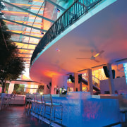 An exterior view of the bars restaurant. - architecture, building, city, condominium, evening, hotel, leisure, metropolitan area, reflection, sky, tourist attraction, blue