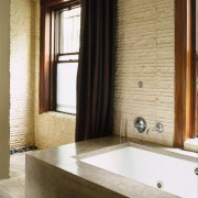 view of this bathroom featuring stained timber cabinetry bathroom, curtain, floor, flooring, interior design, plumbing fixture, room, tile, wall, window, window covering, window treatment, wood, brown