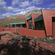 A view of a home built by Natura architecture, facade, hacienda, home, house, landscape, mountain, property, real estate, roof, sky, red, black