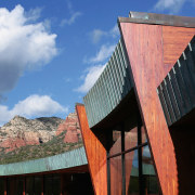 A view of an entrance way designed by architecture, building, cloud, facade, house, landmark, roof, sky, wood, black