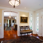 view of the entrance foyer featuring lead sidelight ceiling, dining room, estate, floor, flooring, hardwood, home, interior design, living room, property, real estate, room, wall, window, wood flooring, gray