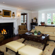 view of the living area featuring coffee table, furniture, home, interior design, living room, property, real estate, room, gray