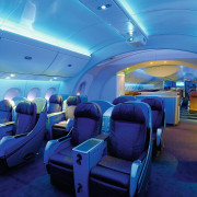 A view of the cabin area. - A aerospace engineering, air travel, aircraft, aircraft cabin, airline, airplane, aviation, blue, interior design, mode of transport, passenger, blue, teal