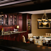 A view of a kitchen by NuHaus Custom interior design, restaurant, black