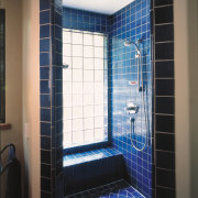 A view of a bathroom by Chadine Interior architecture, bathroom, blue, daylighting, floor, flooring, glass, interior design, room, tile, window, black
