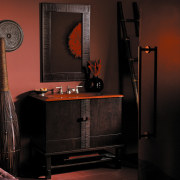 A view of a vanity by Kohler. - darkness, furniture, interior design, lamp, light, light fixture, lighting, room, table, black