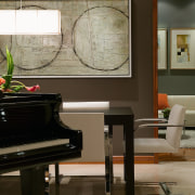 view of the living area featuring tiled flooring, floor, flooring, furniture, home, interior design, keyboard, living room, piano, table, technology, wall, wood, black, gray