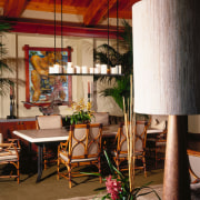 view of the dining area featuring limestone flooring, dining room, furniture, home, interior design, restaurant, table, window