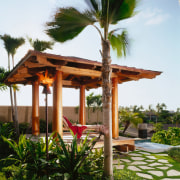 view of the shaded pavillion, day bed, views arecales, gazebo, outdoor structure, palm tree, pavilion, pergola, plant, resort, tree, white, brown