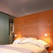 A view of the master bedroom. - A architecture, bed, bedroom, ceiling, furniture, home, interior design, lighting, real estate, room, suite, wall, wood, brown, orange