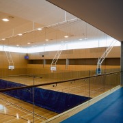 A view of a gym built by Aspec architecture, ceiling, daylighting, floor, flooring, glass, interior design, leisure centre, lobby, sport venue, structure, brown