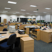 A view of the office furniture. - A classroom, desk, electronics, furniture, institution, interior design, office, personal computer, technology, gray