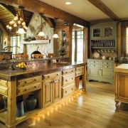 A view of the kitchen, wooden flooring and cabinetry, countertop, cuisine classique, flooring, interior design, kitchen, room, wood, brown