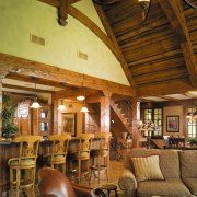 A view of the living area, wooden flooring beam, ceiling, interior design, living room, log cabin, wood, brown