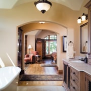 A view of a bathroom. - A view bathroom, ceiling, countertop, daylighting, estate, floor, flooring, hardwood, home, interior design, living room, real estate, room, window, wood flooring, gray, brown