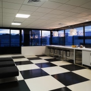 view of the interior of this office sspace floor, flooring, interior design, gray, black