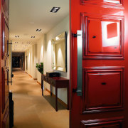 The Loui Corporation works in partnership with paint door, furniture, interior design, lighting, room, red
