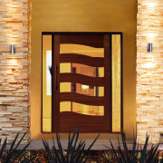 Entranceway of home showing extra wide timber and door, hardwood, lighting, wall, window, wood, wood stain, orange