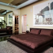 A view of the master bedroom. - A bed, bed frame, bedroom, ceiling, couch, floor, furniture, home, interior design, living room, mattress, real estate, room, window, black, gray